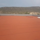 thumbnail of Tinta ecológica de borracha reforçada com fibra (20 kg, azulejo) - Impermeabilização de telhados, fachadas e terraços. Altamente durável e elástica.