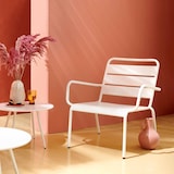 thumbnail of Poltrona reclinabile e poggiapiedi in metallo bianco