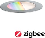 Un luminaire rond avec un dégradé de couleurs.