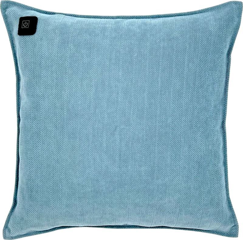 Ein hellblaues Kissen mit einem Muster.