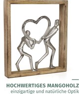 thumbnail of Dekofigur Holding Hearts 34,5 cm aus Mangoholz und Aluminium Skulptur im Holzrahmen mit zwei Personen und Herz Symbol für Liebe und Zusammenhalt