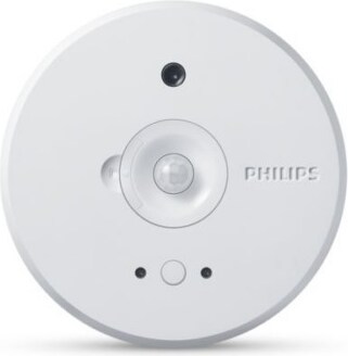 Ein runder, weißer Sensor mit zwei Lichtern.