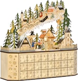 Ein hölzerner Adventskalender mit einer Weihnachtsszene.