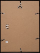 Rückseite eines schwarzen Bilderrahmens mit brauner Rückwand.