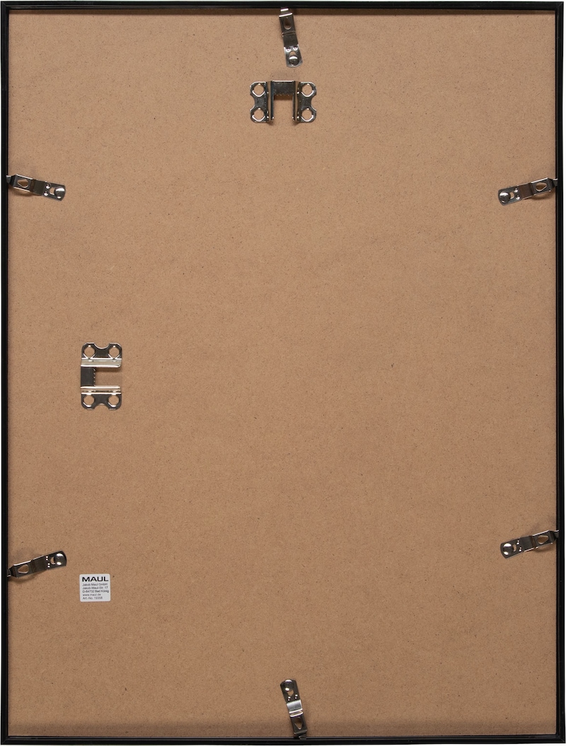 Rückseite eines schwarzen Bilderrahmens mit brauner Rückwand.