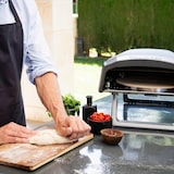 thumbnail of Bergner - Draaibare gas-pizzaoven 64x42,5x30 cm tot 500 ºC met pizzasnijder van roestvrij staal en 3-delige schortset in blauw