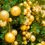 thumbnail of WellHome - Packung mit 100 goldenen Weihnachtskugeln in einer Tube