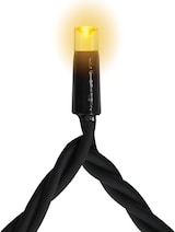 Eine einzelne gelbe LED-Leuchte an einem schwarzen Kabel.