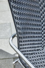 thumbnail of METRO Professional terrasstoel Milano, staal/ PE-rotan, 56 x 56 x 88 cm, met armleuningen, stapelbaar, zwart