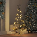 Ein beleuchteter Weihnachtsbaumständer mit Stern.