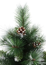 Un albero di Natale artificiale con pigne e neve.