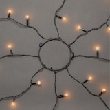 thumbnail of Konstsmide LED Baummantel mit Ring Ø 11, mit Globes, 8 Stränge à 30 bernsteinfarbene  Dioden, vormontiert, 24V_Außentrafo, schwarzes Kabel
