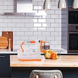 thumbnail of WellHome - Pelador de fruta de plástico ABS color Naranja y blanco