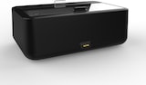 Un dispositivo rectangular negro con un asa plateada.