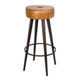 thumbnail of ANTICLINE - Tabouret de bar assise cuir de buffle et structure en fer, L 40cm x H 81 cm, assise  Ø33cm et épaisseur 10,5 cm, medium brown, repose-pied