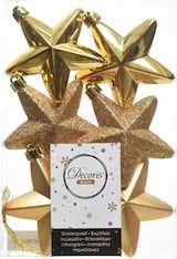 Sechs goldene Sterne als Baumschmuck.