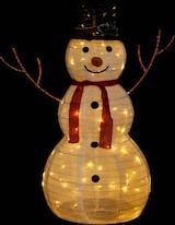 Ein beleuchteter Schneemann mit Schal und Hut.