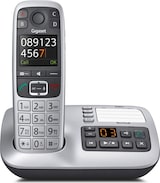 Ein schnurloses Telefon mit Ladestation.