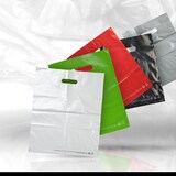 thumbnail of Saco plástico vermelho com pegas recortadas de PEBD reciclado 25x32 cm por 1000 - Gimex