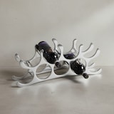 thumbnail of Modernes Weinregal aus Metall, Kapazität für 9 Flaschen, in silberner Farbe, handgefertigt, stabil und dekorativ. 55x12x20 cm | Kadima Design