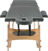 Ein tragbarer Massagetisch mit verstellbarem Kopfteil.