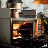 thumbnail of Horno de carbón de sobremesa, dimensiones 785x577x1095, puerta roja