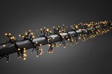 thumbnail of Konstsmide Micro LED Büschellichterkette "Cluster", mit 8 Funktionen, 2016 bernsteinfarbene Dioden, 36V, Außen (IP44), schwarzes Kabel - 3866-800