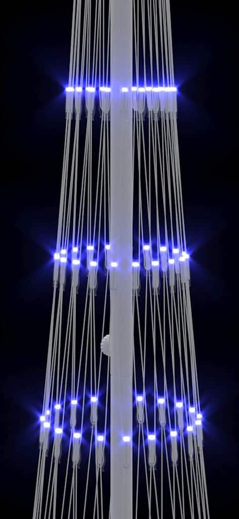 Ein weißer Mast mit blauen Lichtern.