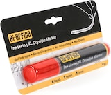 Um marcador vermelho em blister.