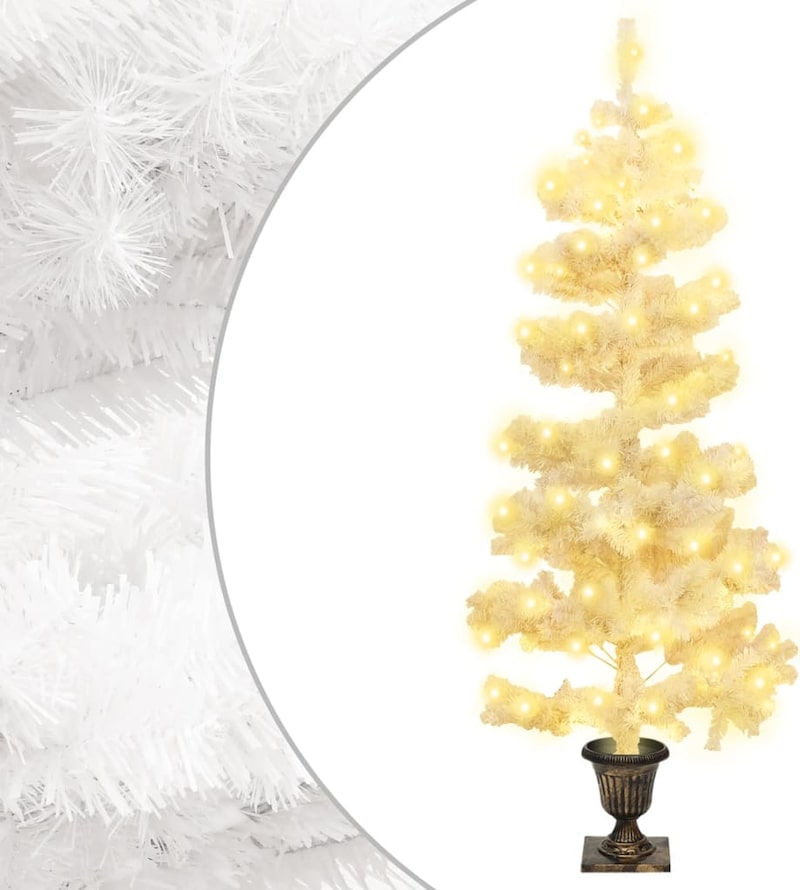 Ein weißer Weihnachtsbaum mit Lichtern in einem Topf.