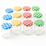 thumbnail of 80 ML - Set van 12 Mini Glazen Potjes met Geruite Deksels – Ø 5 × H 7 cm – Bewaar-, Inmaak- & Cadeaupotjes