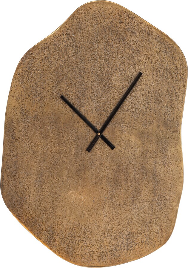 Eine unregelmäßig geformte Wanduhr aus Messing.