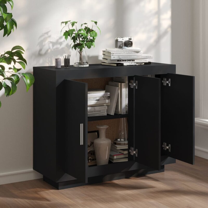 Ein schwarzer Schrank mit offenen Türen.