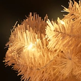 Ein weißer Weihnachtsbaum mit Lichtern.