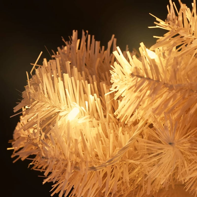 Ein weißer Weihnachtsbaum mit Lichtern.