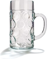 Een lege, doorzichtige bierpul met bubbelpatroon.