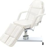 Ein weißer Massagestuhl mit verstellbarer Rückenlehne und Fußstütze.