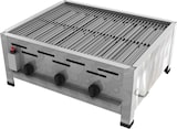 Ein Gasgrill mit drei Knöpfen und einem roten Knopf.