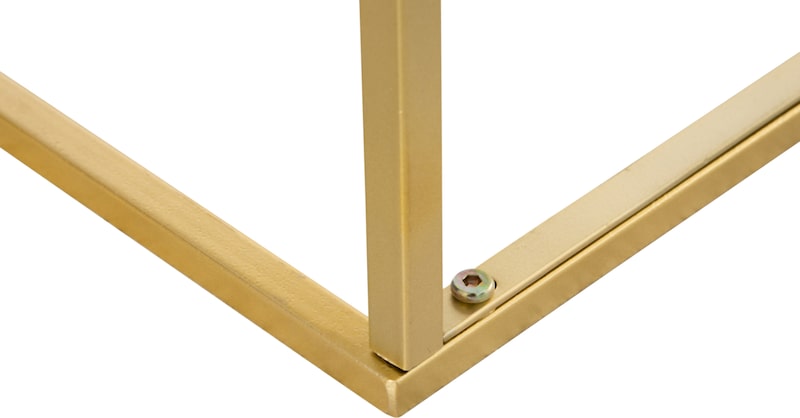 Una cornice in metallo dorato con una vite.