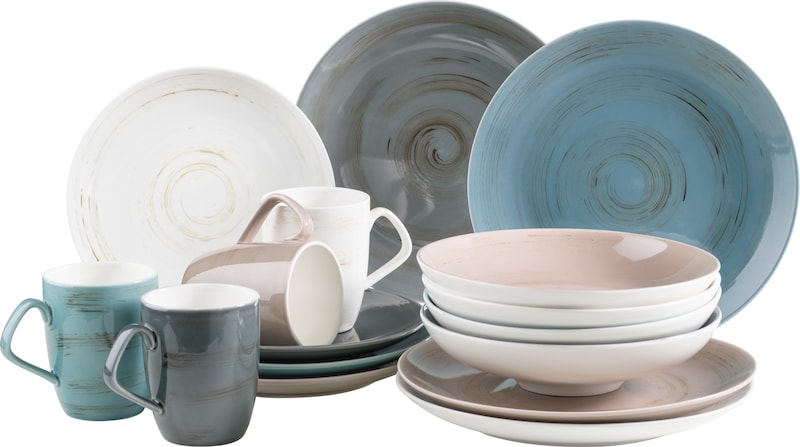 Een servies set met borden en kopjes.