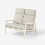 thumbnail of Sofá exterior de 2 lugares com estrutura em alumínio off-white e almofadas cinzentas.