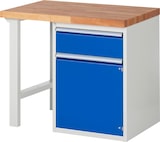 Ein Werkstatttisch mit blauer Schublade und Tür.