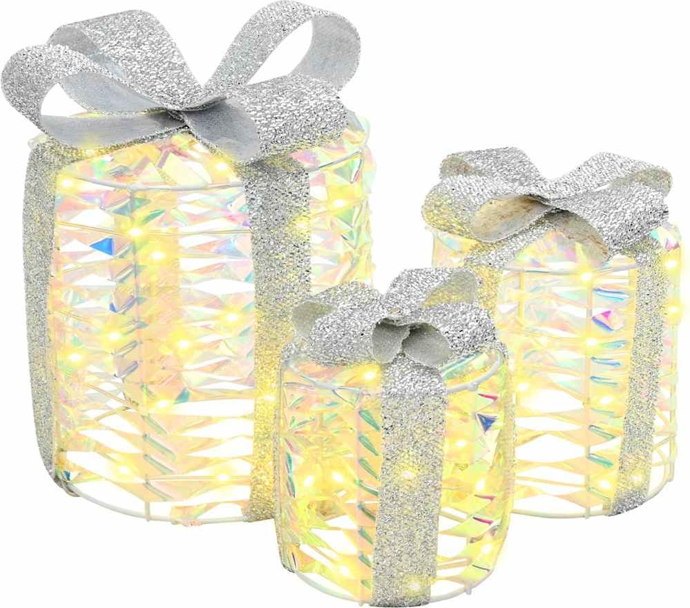 Drei beleuchtete Geschenkboxen mit silbernen Schleifen.