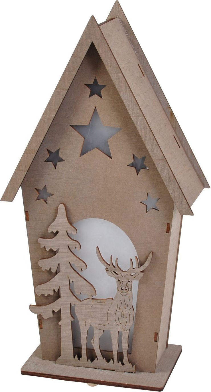 Ein hölzernes Haus mit einem Rentier und Baum.