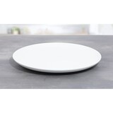 thumbnail of Servierplatte SOLEA, rund, flach, Durchm. 30 cm, von Caterado. Aus weißem Porzellan. Auch als Pizzateller geeignet (bis ca. 26 cm).