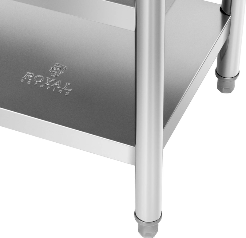 Een deel van een roestvrijstalen tafel met poten.