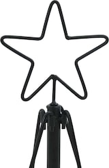 Ein schwarzer Stern-Baumschmuck.