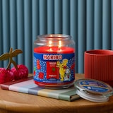 thumbnail of Haribo™ Duftkerze Winter Cherry, 2 Dochte, HxD: 13x10 cm, 100h Brenndauer, Kerze im Glas, Karamell, Kirsche, Orange, rot