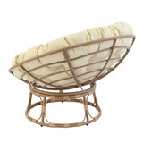 thumbnail of Fauteuil en acier et rotin synthétique avec coussin blanc