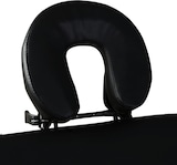 Ein schwarzes Kopfkissen für Massageliegen.